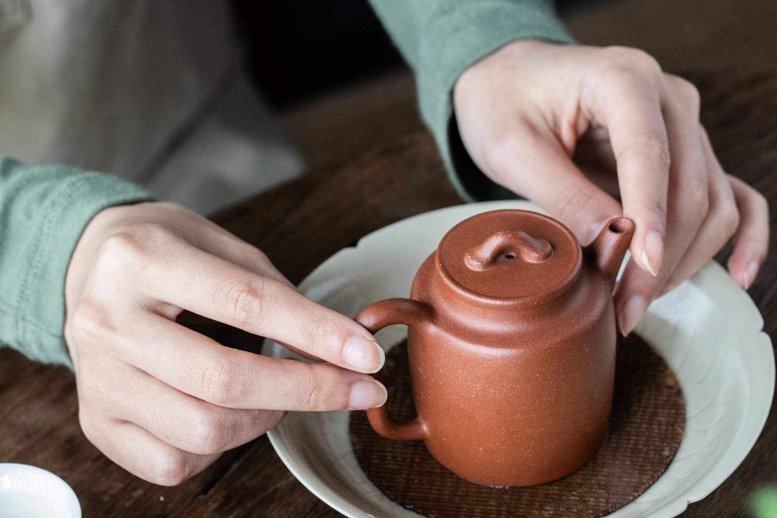 Small Brown Teapot With White Teacups